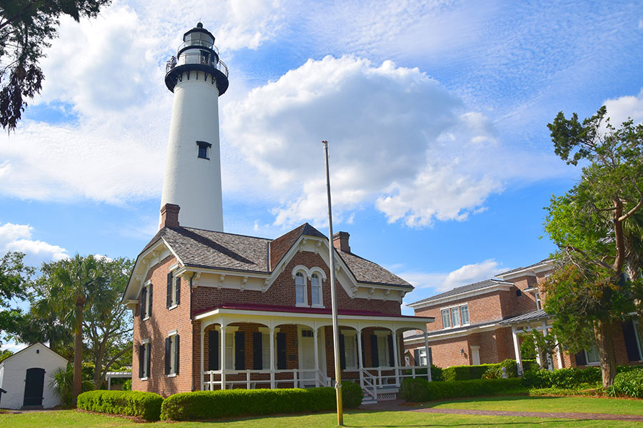 Contact - Angled View of a Lighthouse on St. Simons Island on a Sunny Day